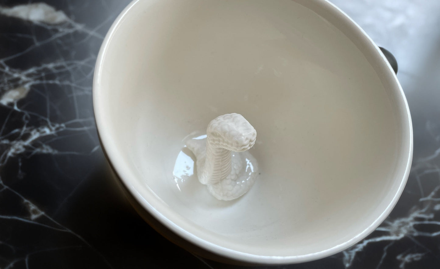 Ceramic Snake at the bottom of the mug