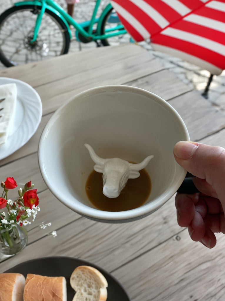 Cow Bull Longhorn Coffee Mug at a cafe