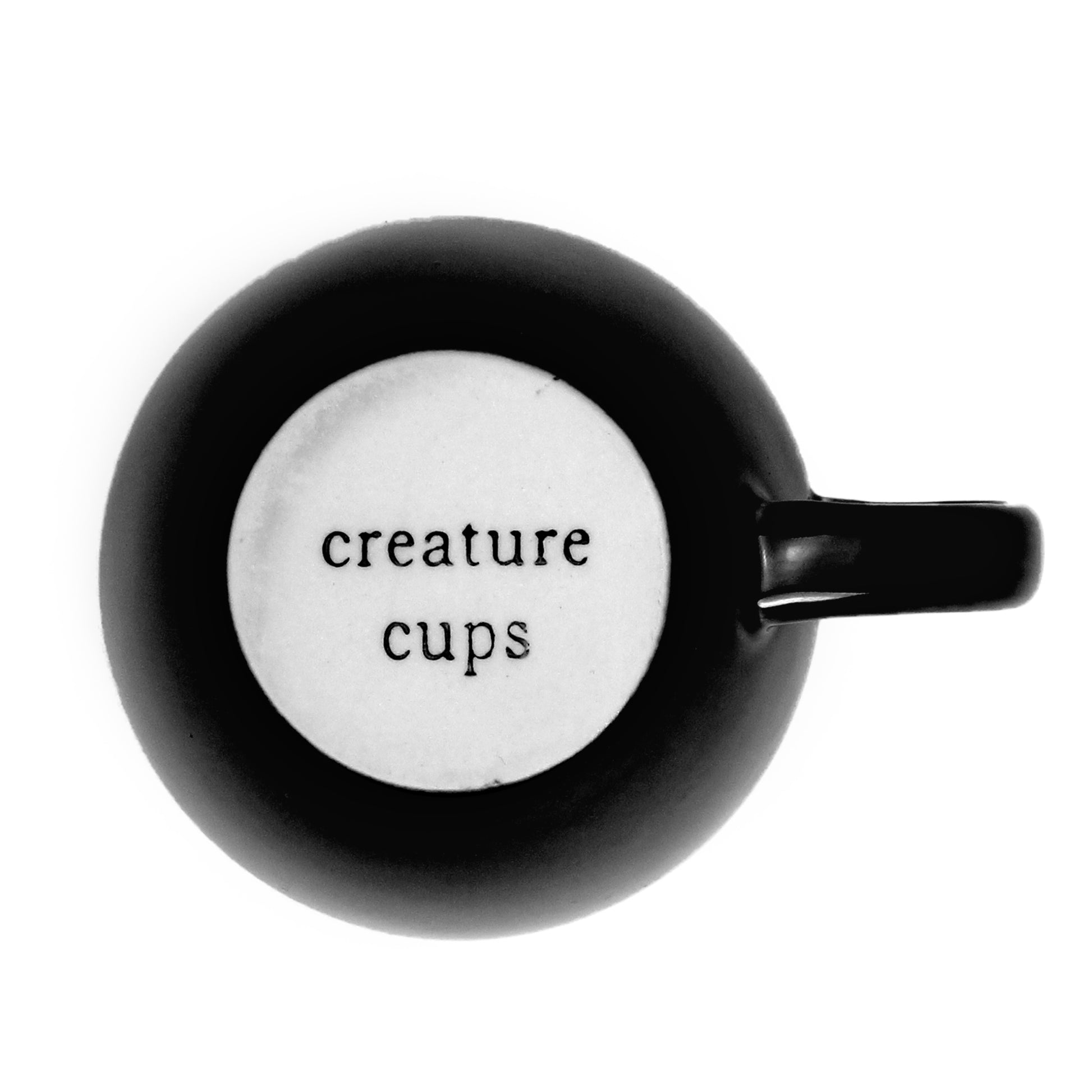 Exterior bottom of Charcoal colored Creature cup with 'creature cups' printed on it