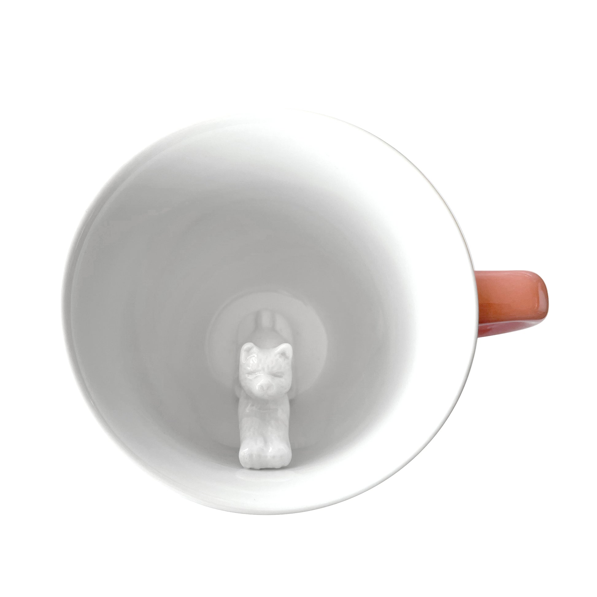 Peach colored Stretching cat Creature cup interior top view