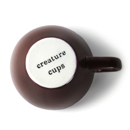 Dark brown Creature Cup bottom exterior