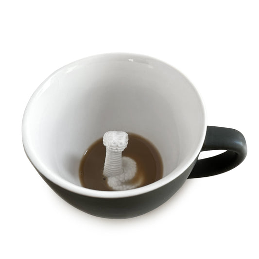 Matte olive brown snake Creature Cup partially submerged interior